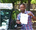  Richard with Driving test pass certificate